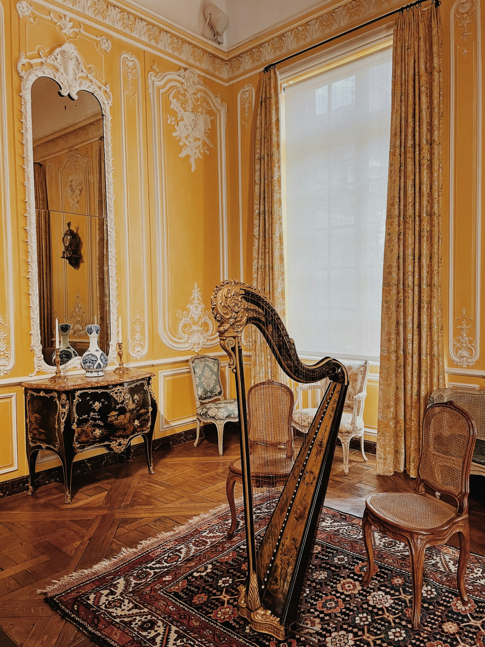 A pedal harp in an elegant salon