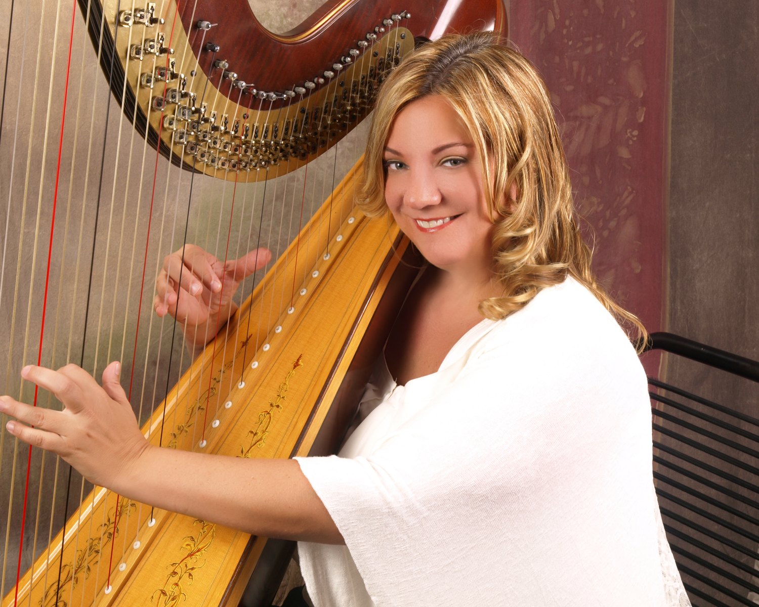 Patricia Turse at her pedal harp